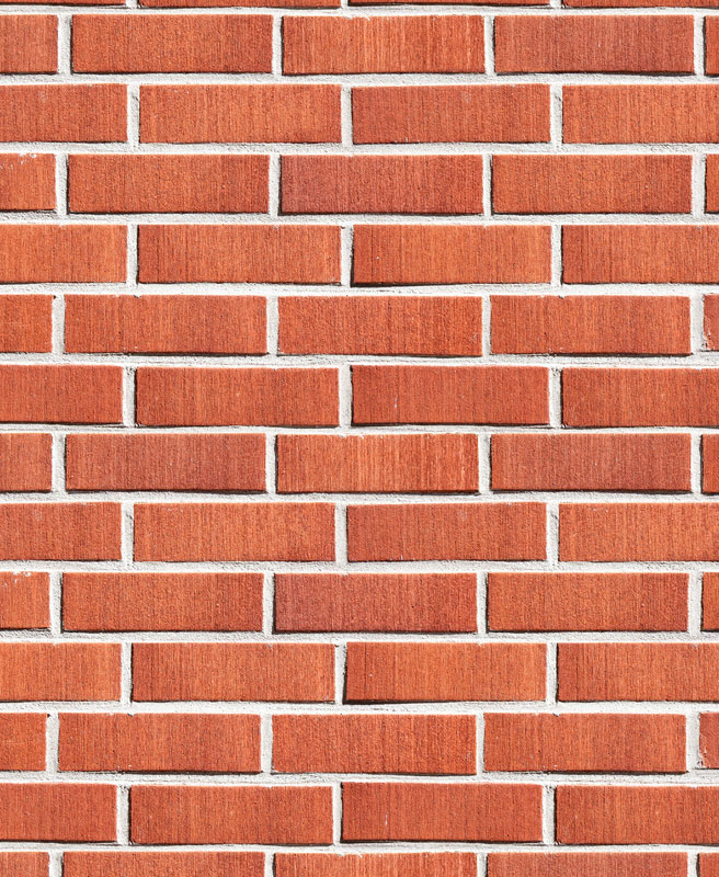 A brick wall made up of rectangular bricks.