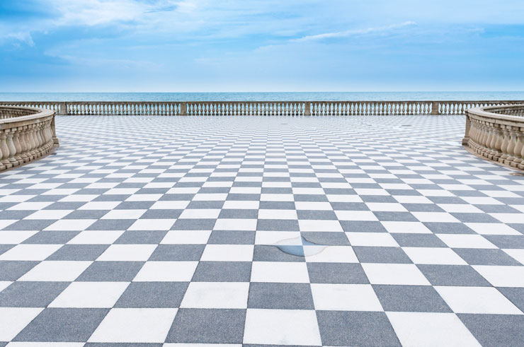 A promenade made up of square tiles.