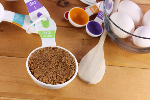  Measuring cups of various sizes, including 1 cup, half cup and quarter cup.