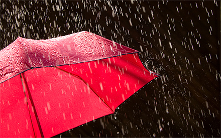 A red umbrella in the rain