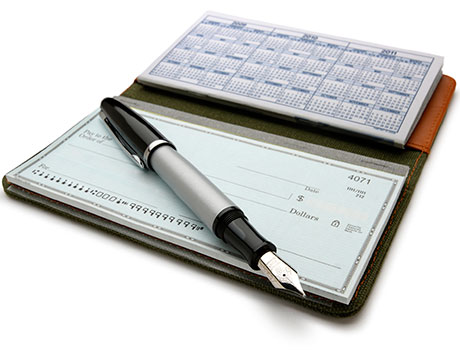 Cheque book with pen