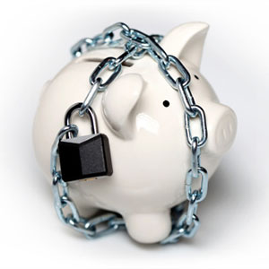 Piggy bank with a lock tied around it.