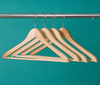 Triangular, wooden hangers.
