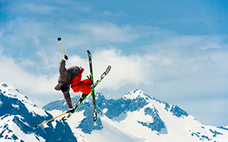 Skier doing a trick during a jump.